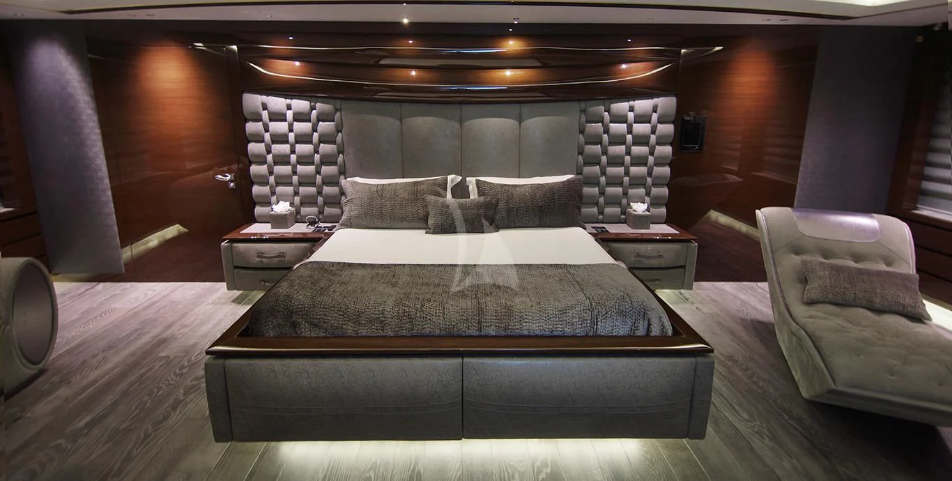 a bed in a room aboard BABA'S Yacht for Sale