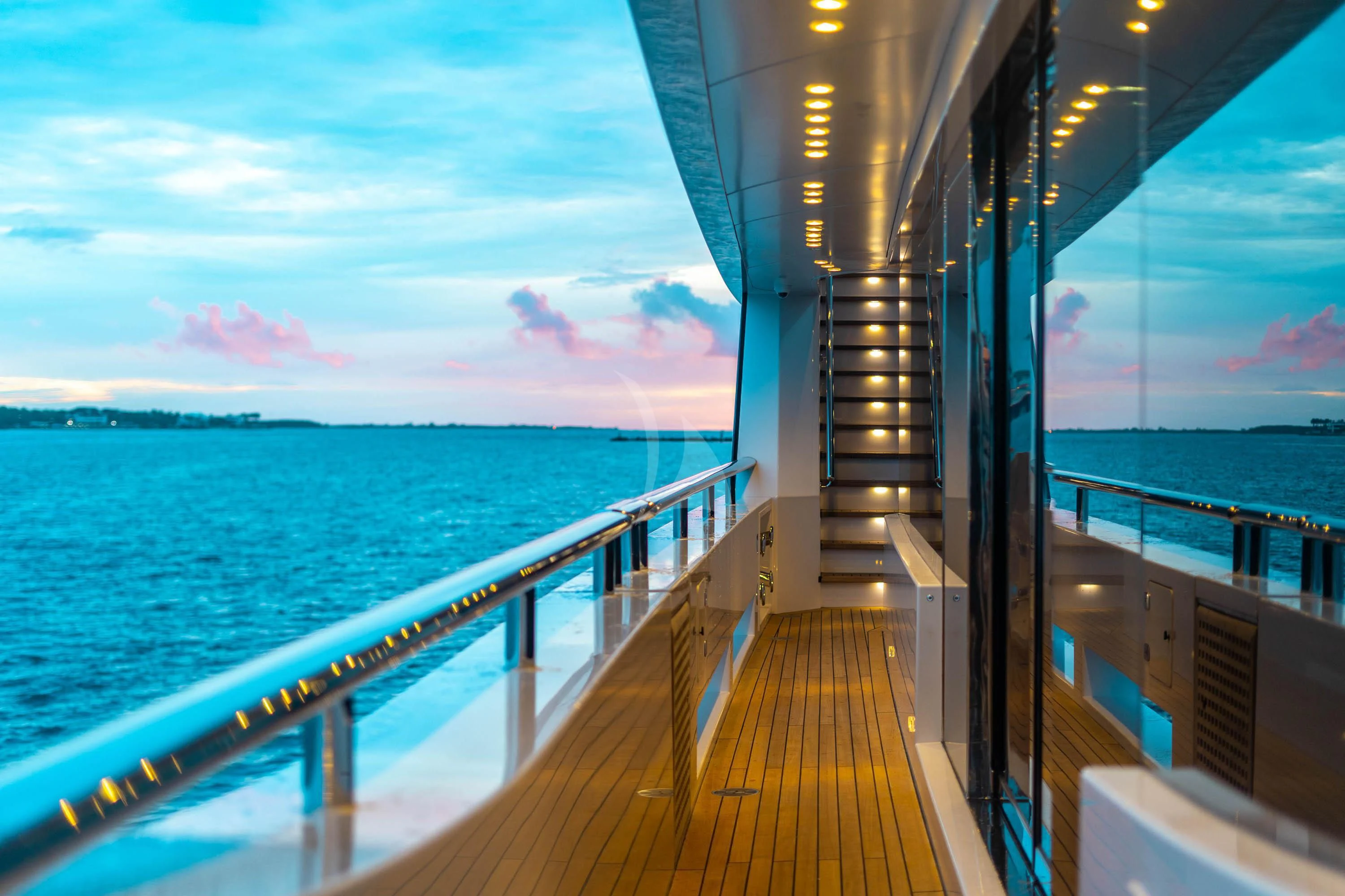 a wooden walkway over water aboard BABA'S Yacht for Sale