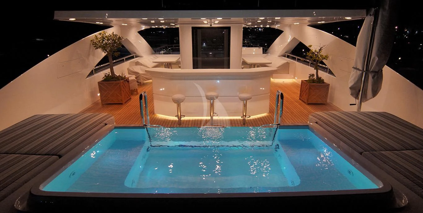 a swimming pool in a hotel aboard BABA'S Yacht for Sale
