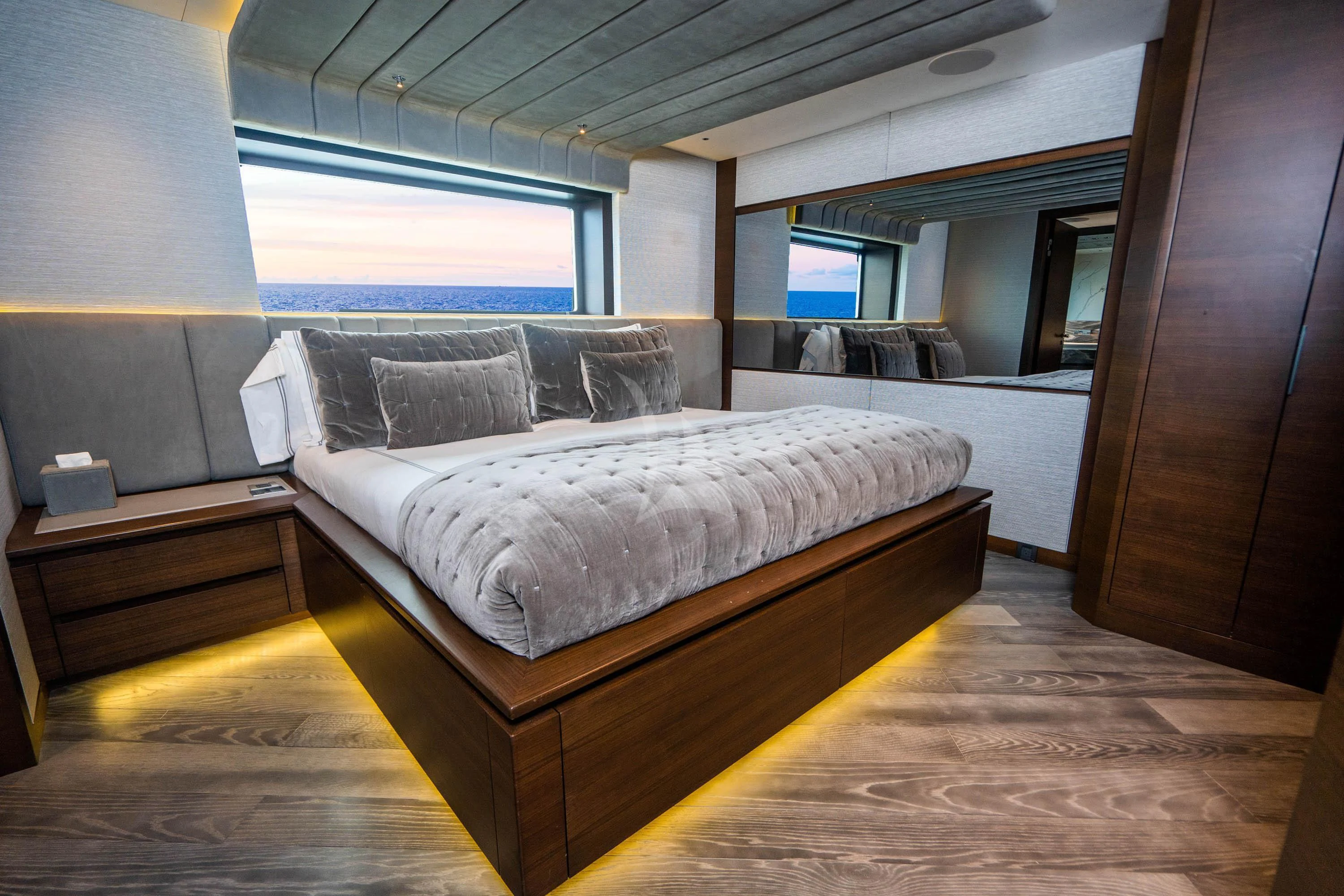 a room with a bed and a desk aboard BABA'S Yacht for Sale