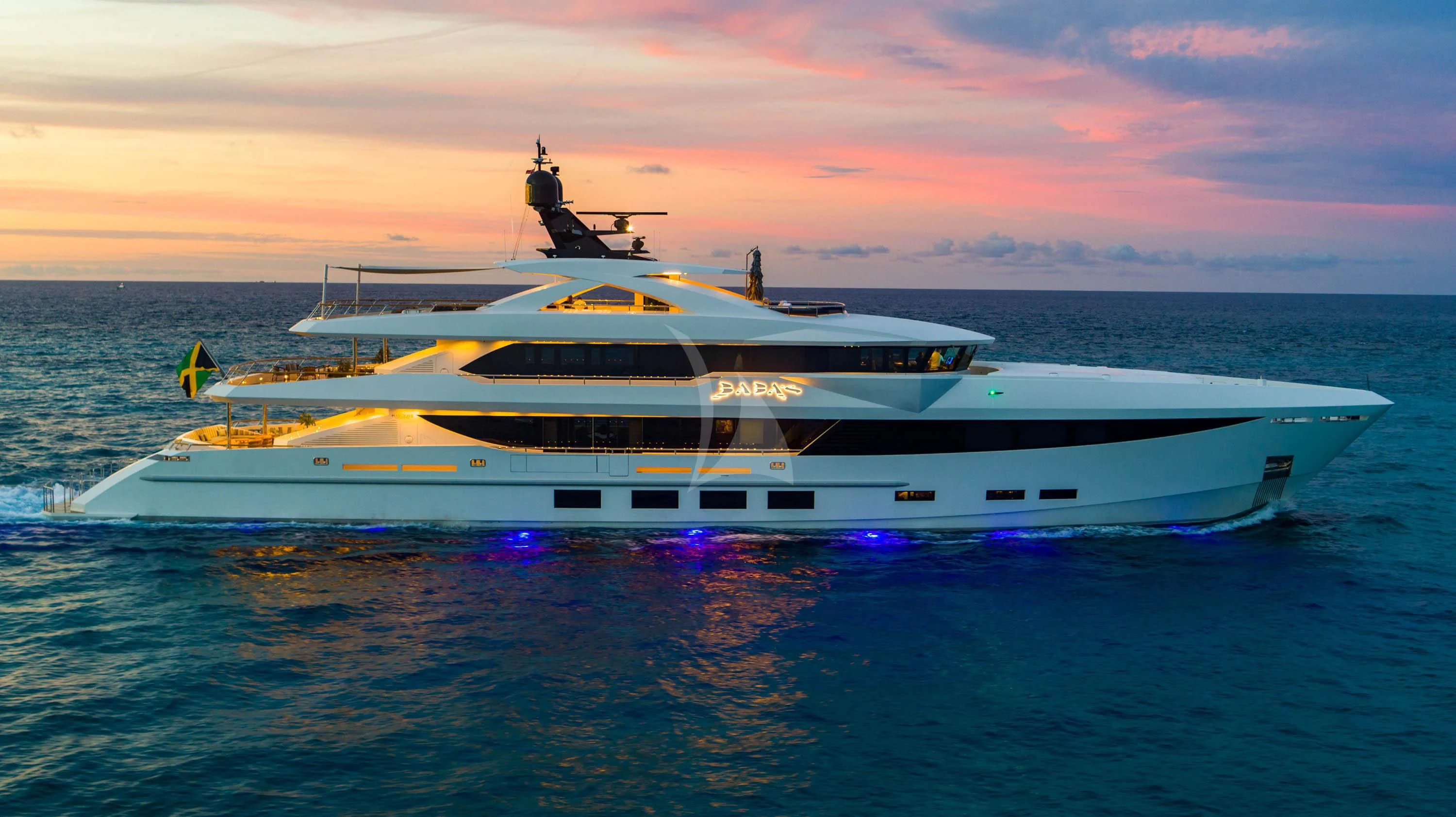 a white yacht in the water aboard BABA'S Yacht for Sale