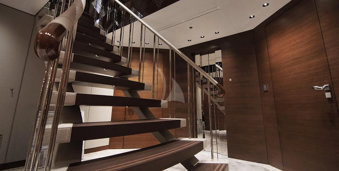 a set of stairs in a building aboard BABA'S Yacht for Sale