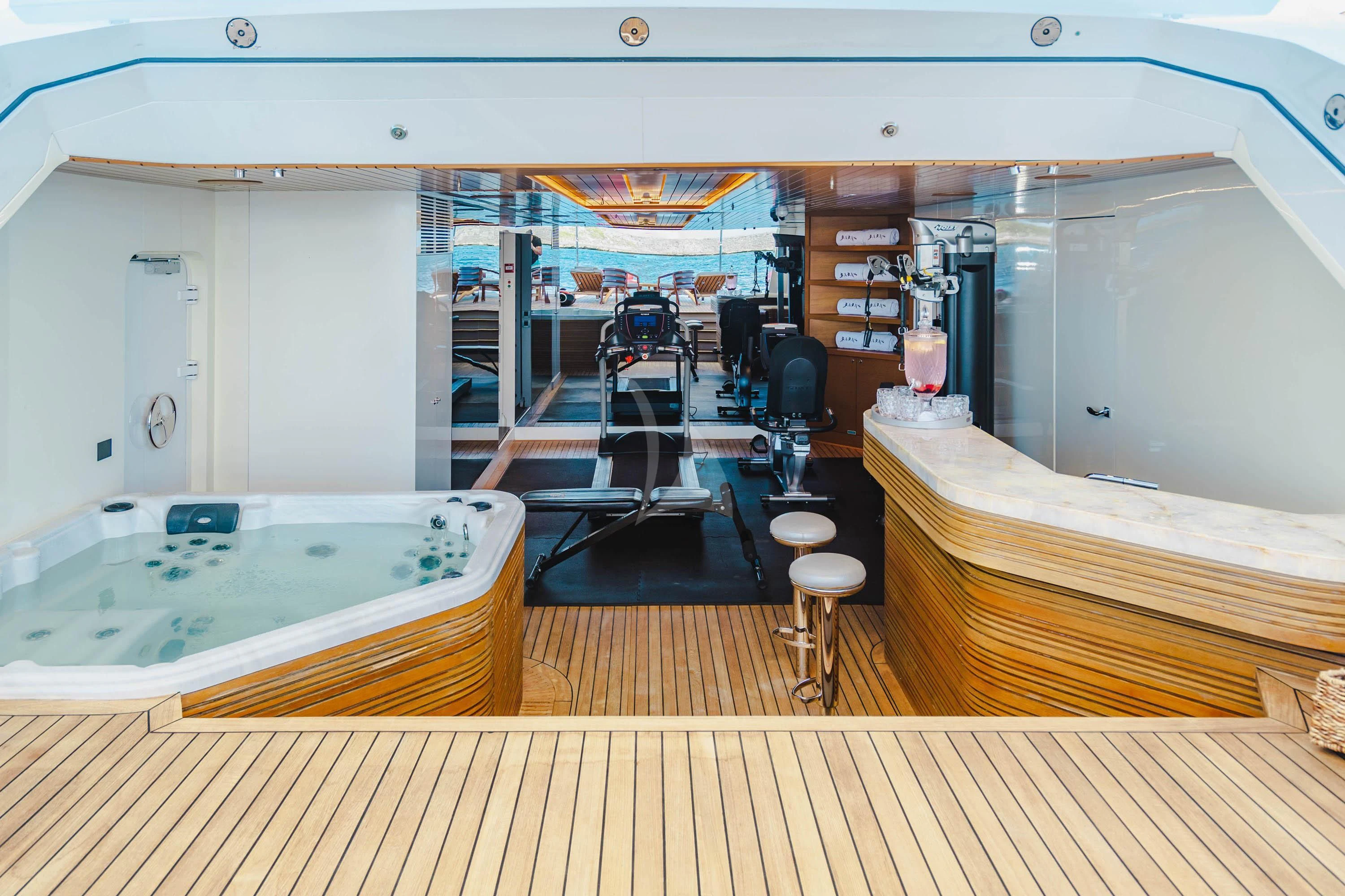 a room with a large mirror aboard BABA'S Yacht for Sale
