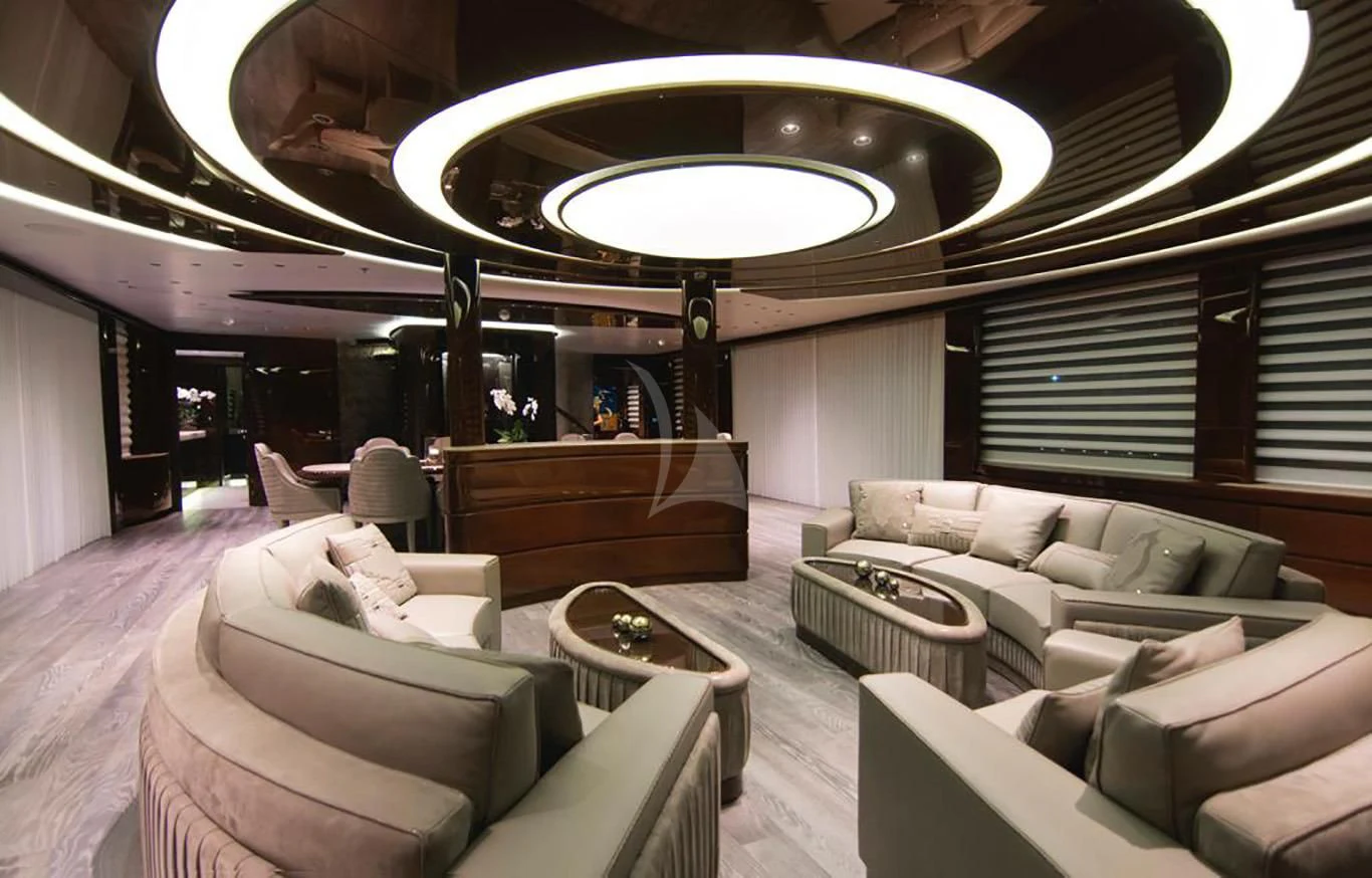 a room with couches and a table aboard BABA'S Yacht for Sale