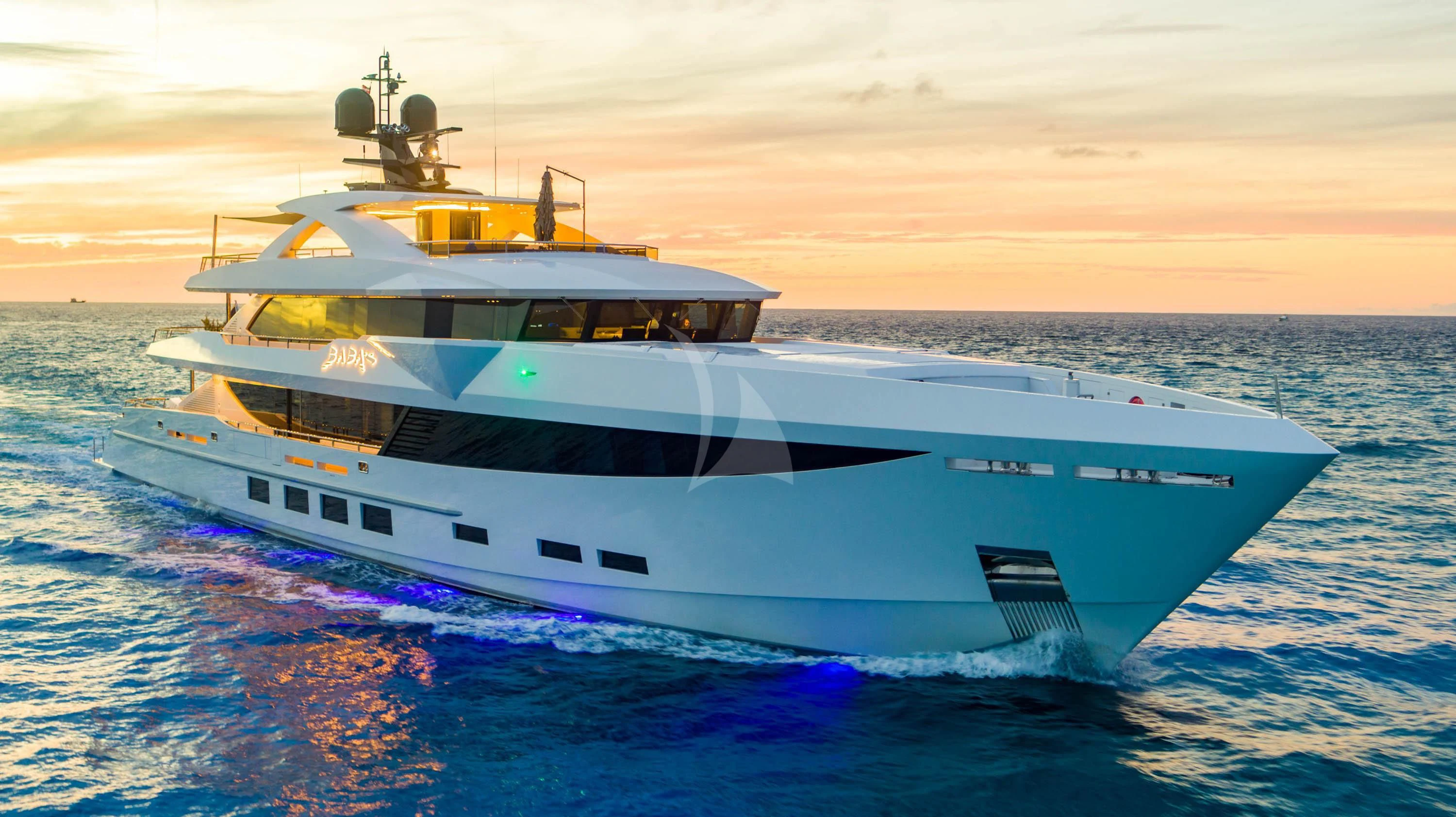 a white yacht in the water aboard BABA'S Yacht for Sale