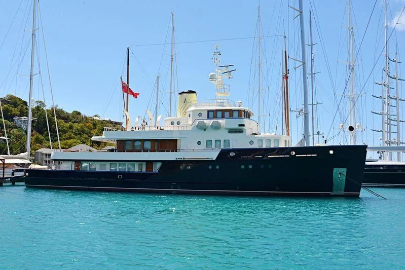 a large boat in the water aboard BYSTANDER Yacht for Sale
