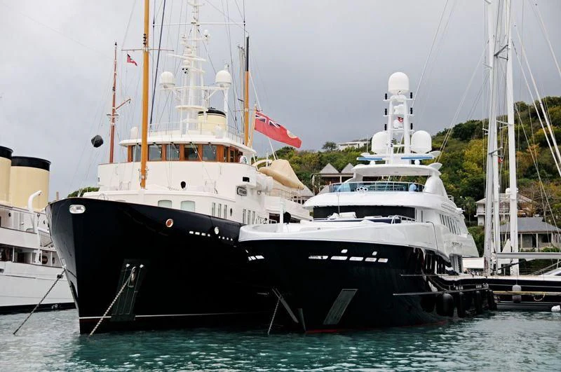 a couple of large boats docked aboard BYSTANDER Yacht for Sale