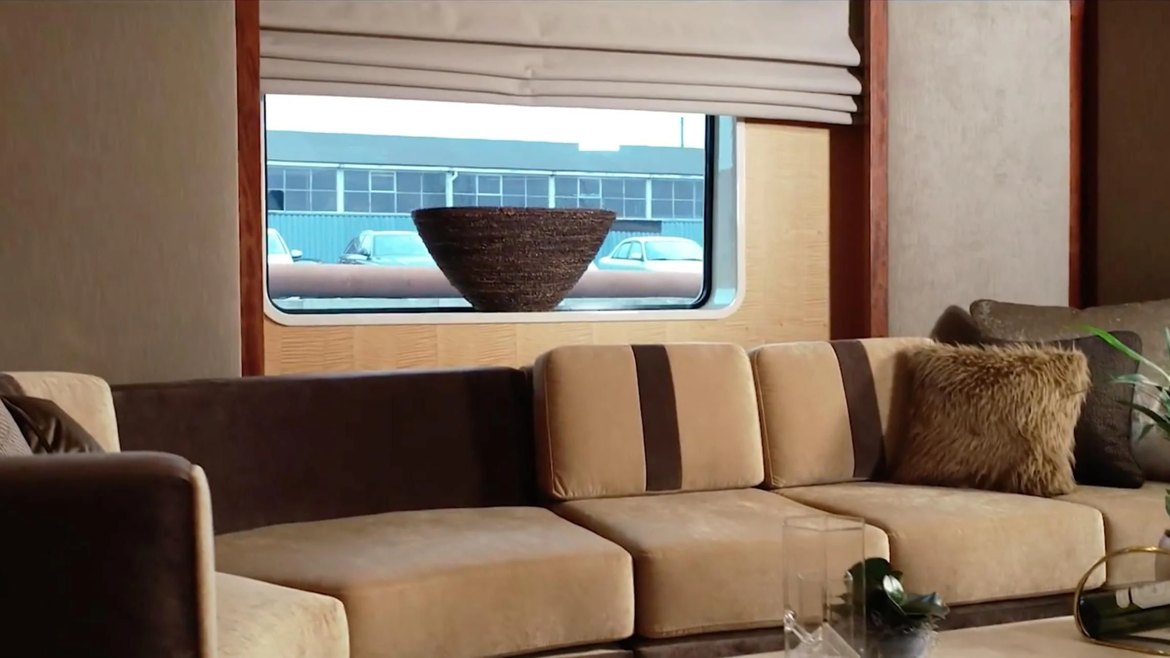 a couch and a bowl on a table aboard ANNA J Yacht for Sale