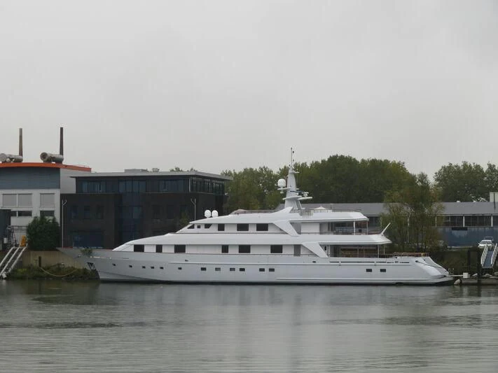 a white yacht in a harbor aboard ANNA J Yacht for Sale