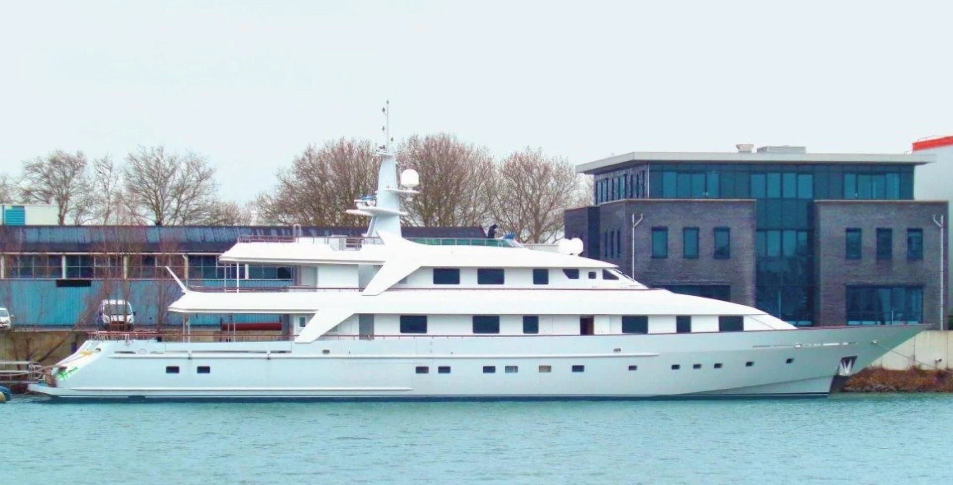 a large white boat in a body of water aboard ANNA J Yacht for Sale