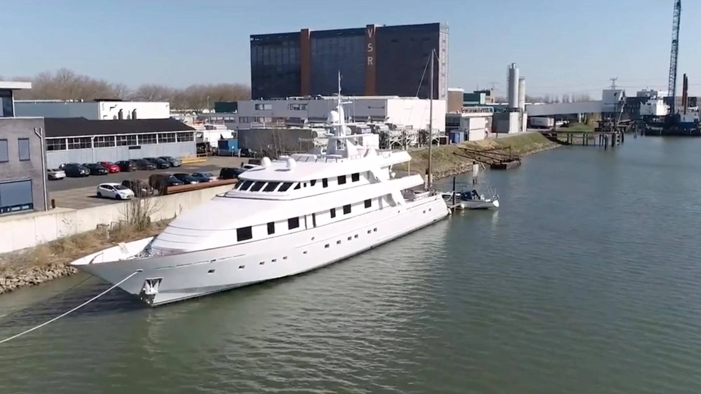 a large white boat in the water aboard ANNA J Yacht for Sale