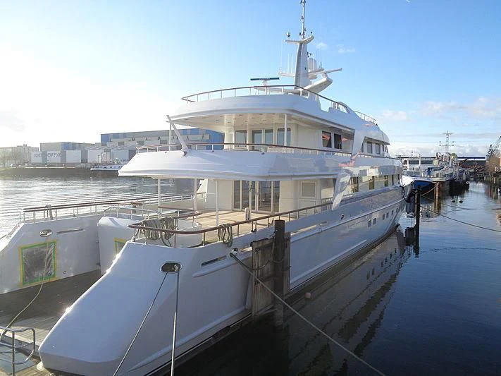 a large white boat docked aboard ANNA J Yacht for Sale
