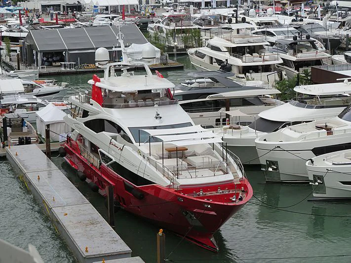 a group of boats are parked in a harbor aboard HAPPY D Yacht for Sale