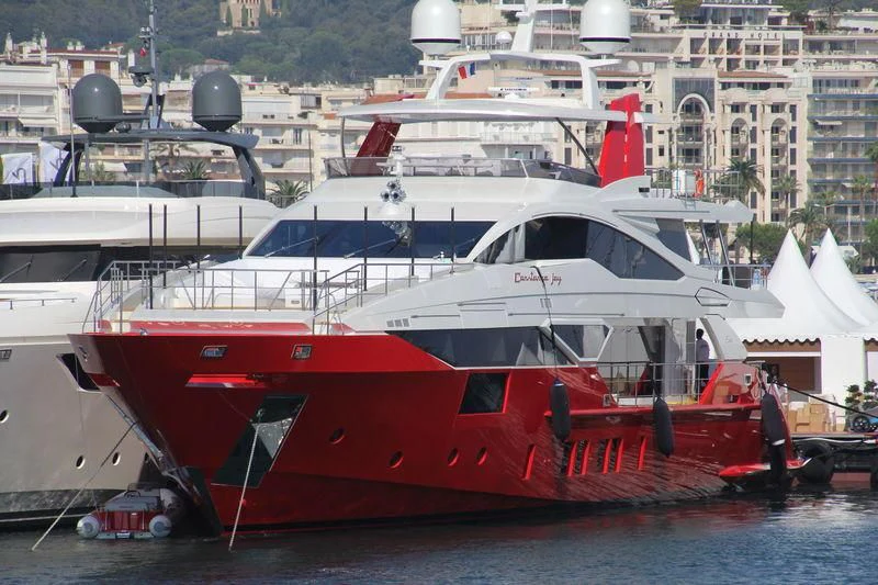 a boat docked at a pier aboard HAPPY D Yacht for Sale
