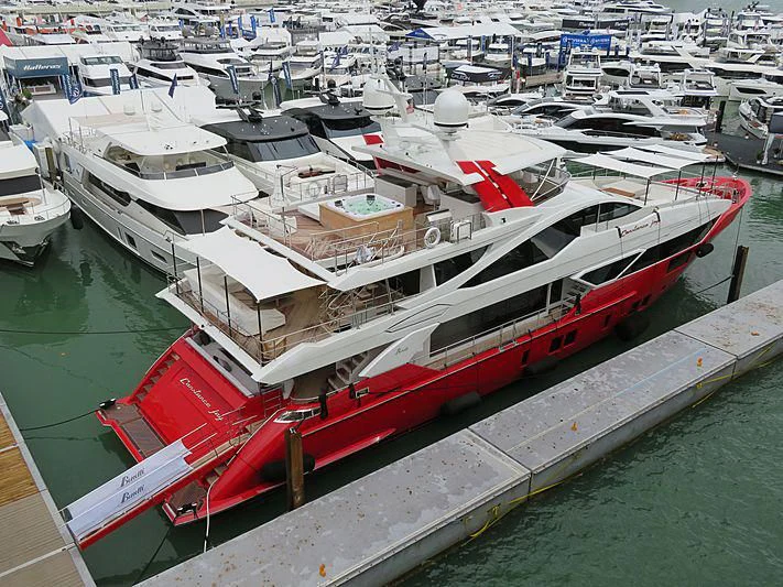 a large boat in a harbor aboard HAPPY D Yacht for Sale
