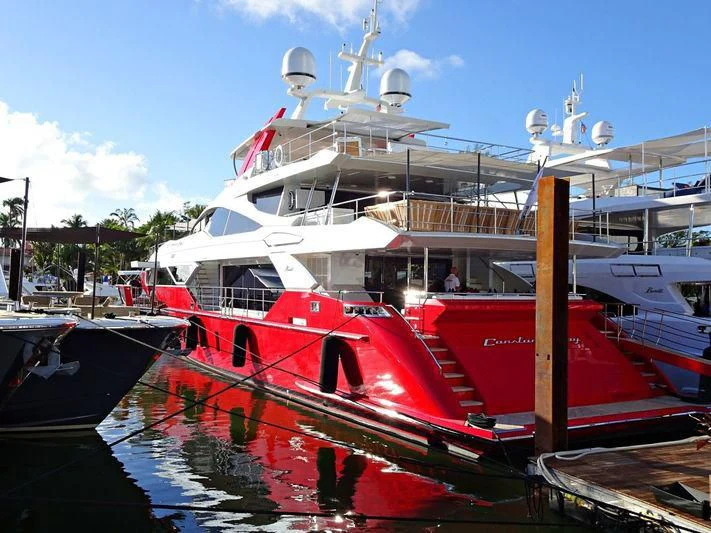 a boat docked at a pier aboard HAPPY D Yacht for Sale