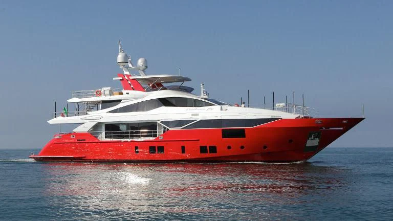 a large red and white boat aboard HAPPY D Yacht for Sale