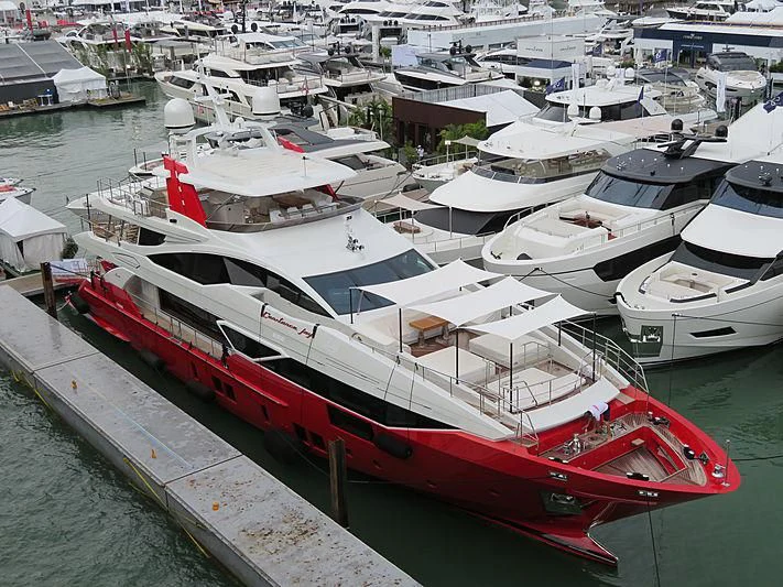 a boat docked in a harbor aboard HAPPY D Yacht for Sale