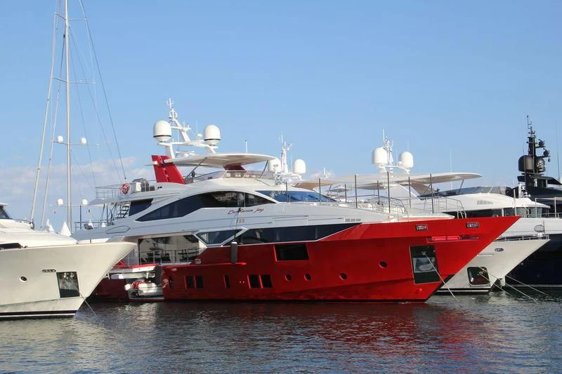 a large red and white boat aboard HAPPY D Yacht for Sale