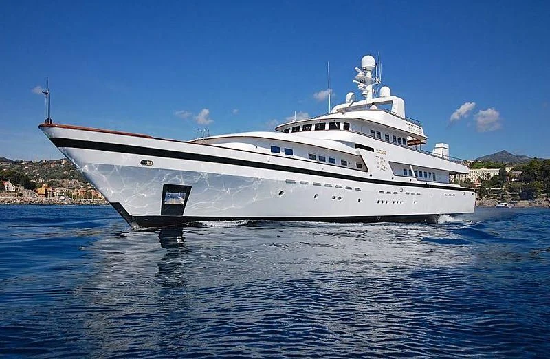 a white yacht in the water aboard CURIOSITY Yacht for Sale