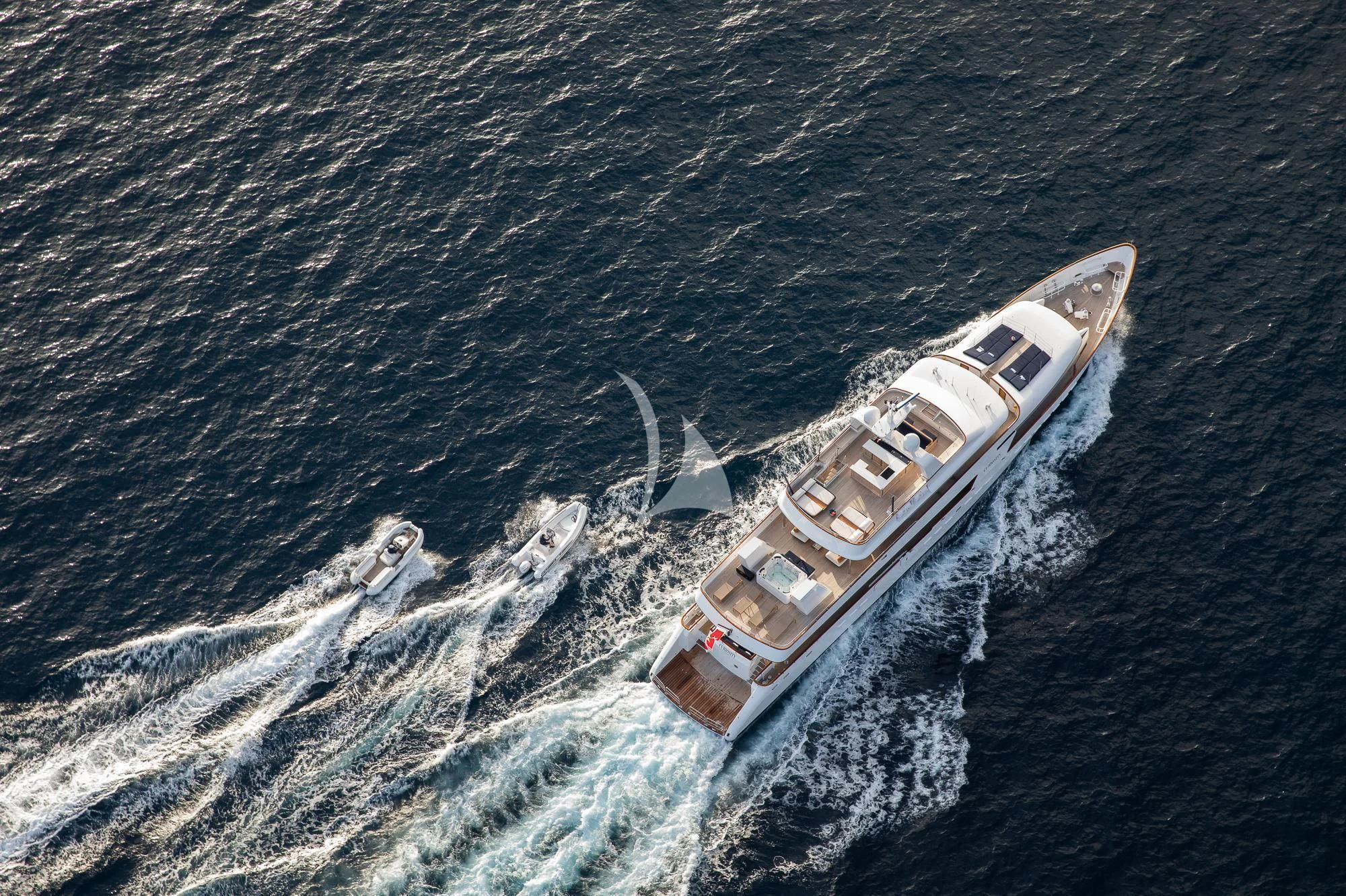 a boat in the water aboard CURIOSITY Yacht for Sale
