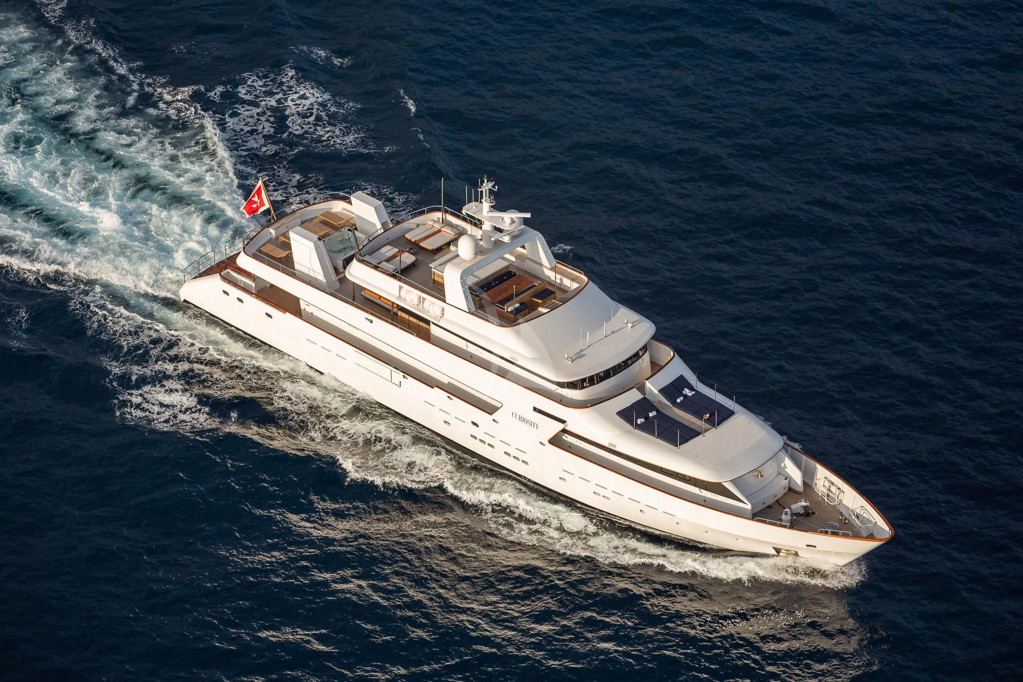 a ship on the water aboard CURIOSITY Yacht for Sale