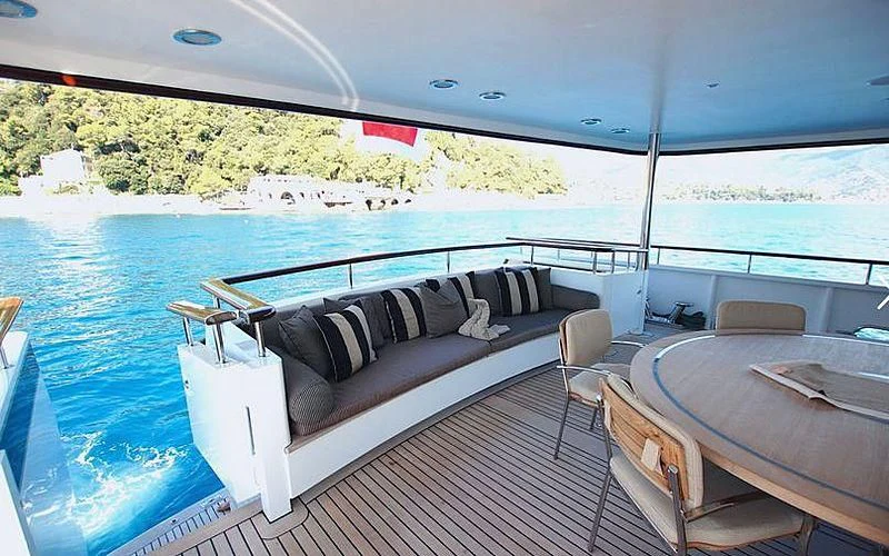 a boat on the water aboard CURIOSITY Yacht for Sale