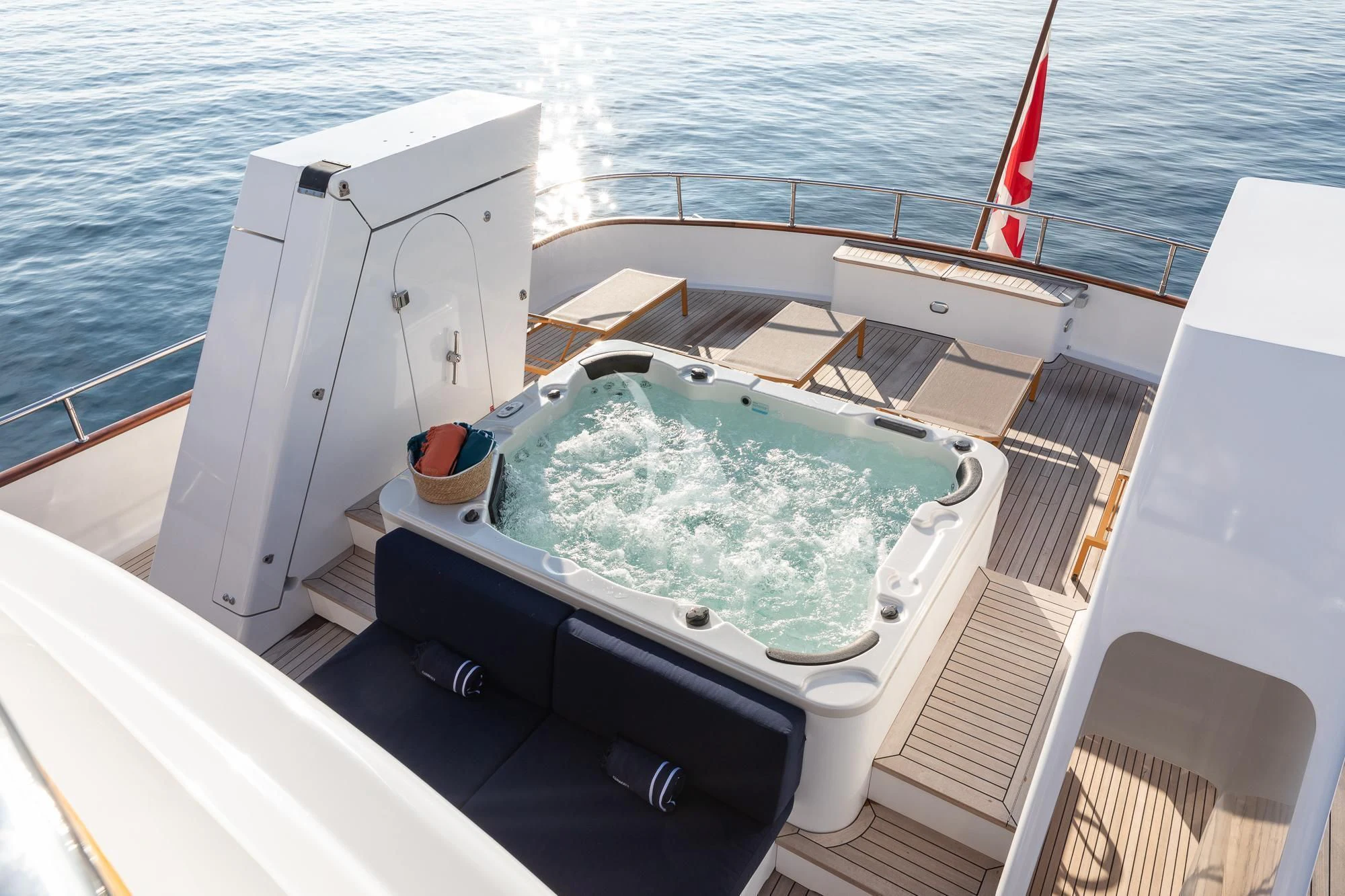a boat with a large amount of green stuff on it aboard CURIOSITY Yacht for Sale