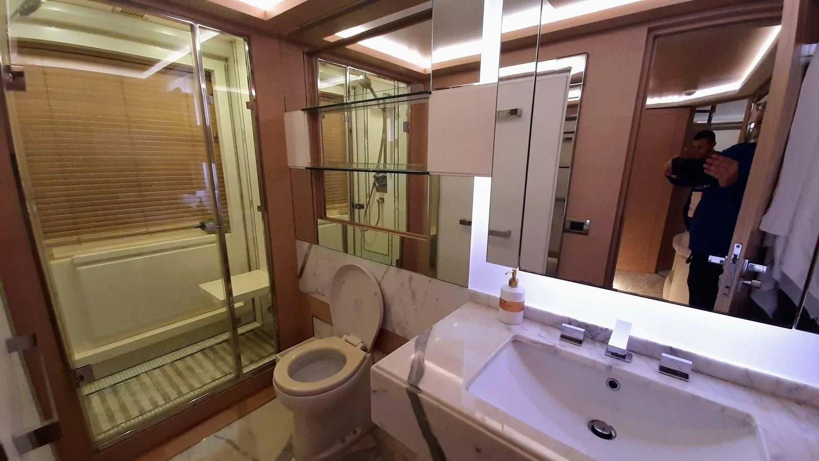 a bathroom with a sink and a toilet aboard SEA BEAR Yacht for Sale