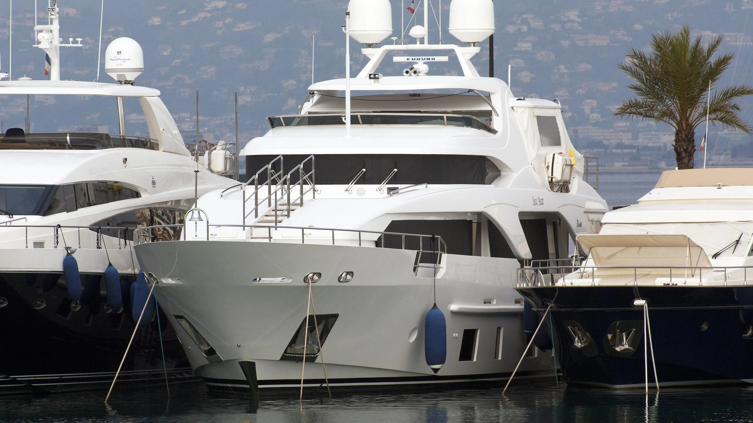a group of boats are parked in a harbor aboard SEA BEAR Yacht for Sale