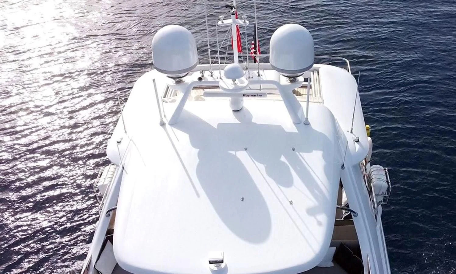 a white boat in the water aboard SEA BEAR Yacht for Sale