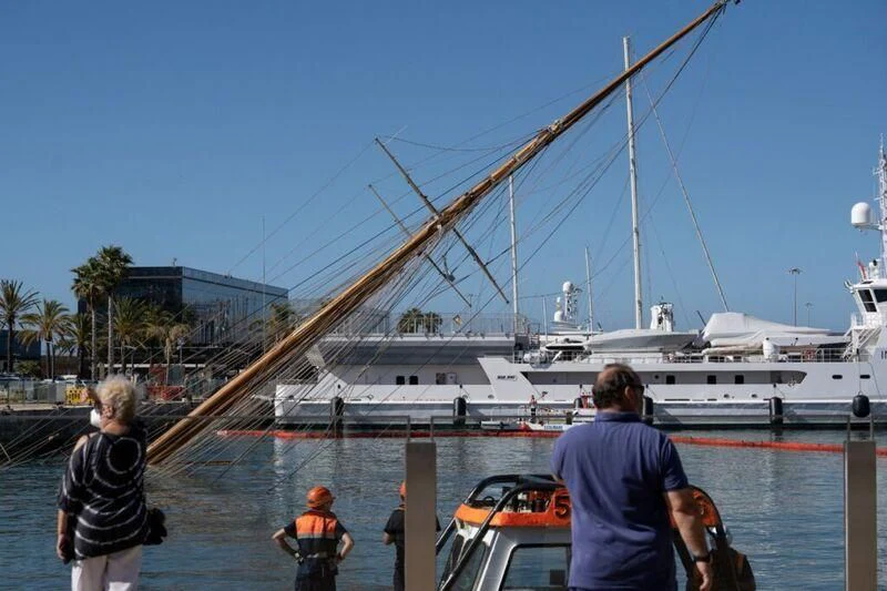 a boat with a crane on the water aboard ELEONORA E Yacht for Sale