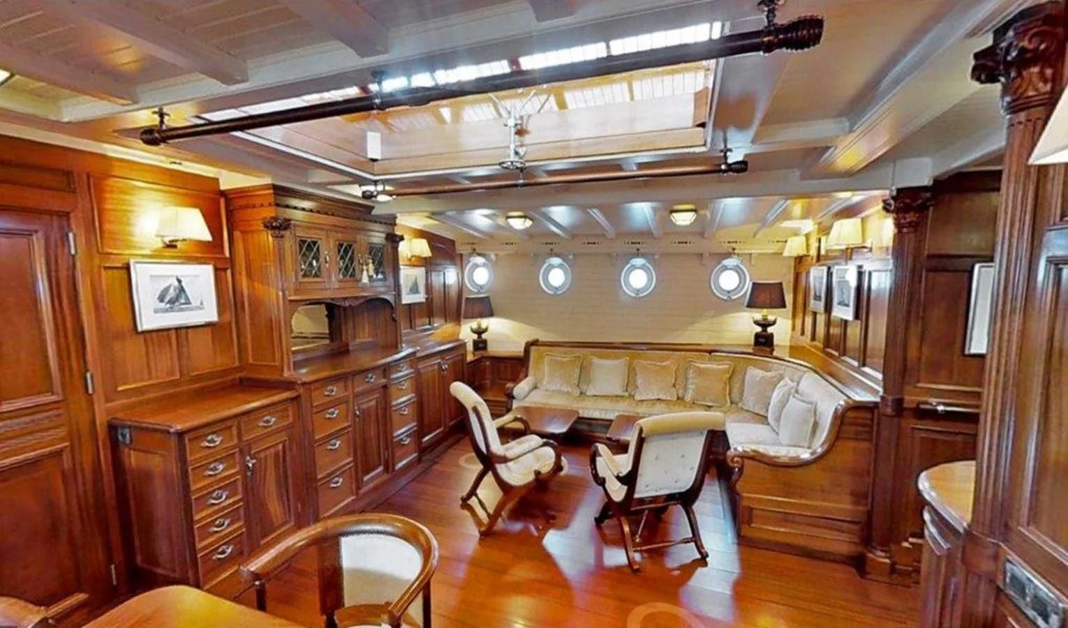 a room with wooden furniture aboard ELEONORA E Yacht for Sale