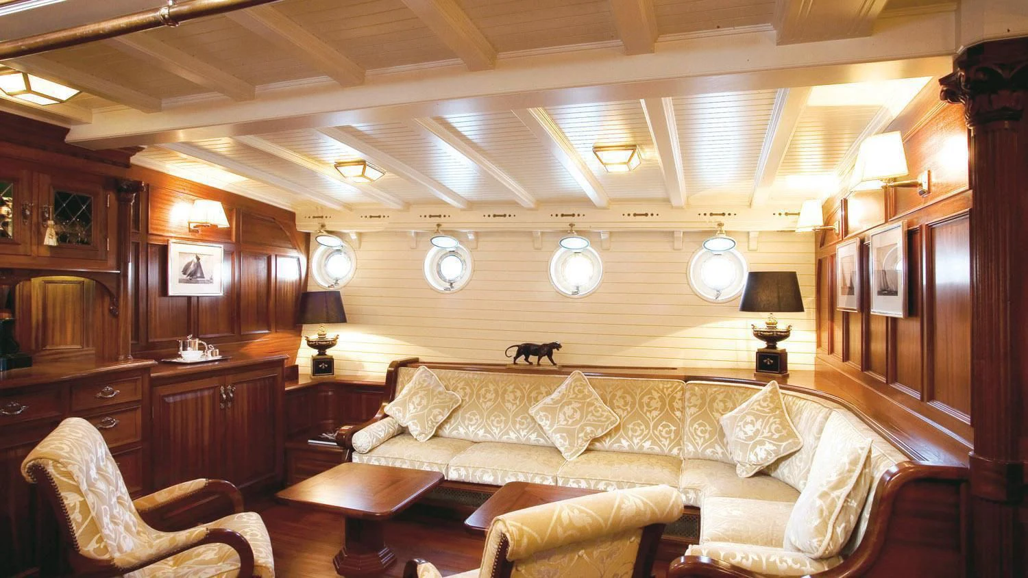 a living room with a couch and a table aboard ELEONORA E Yacht for Sale