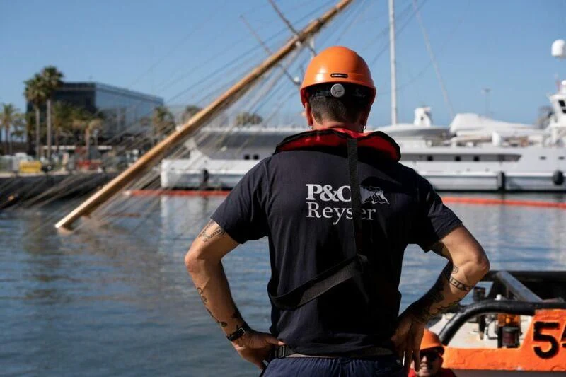 a man wearing a helmet aboard ELEONORA E Yacht for Sale