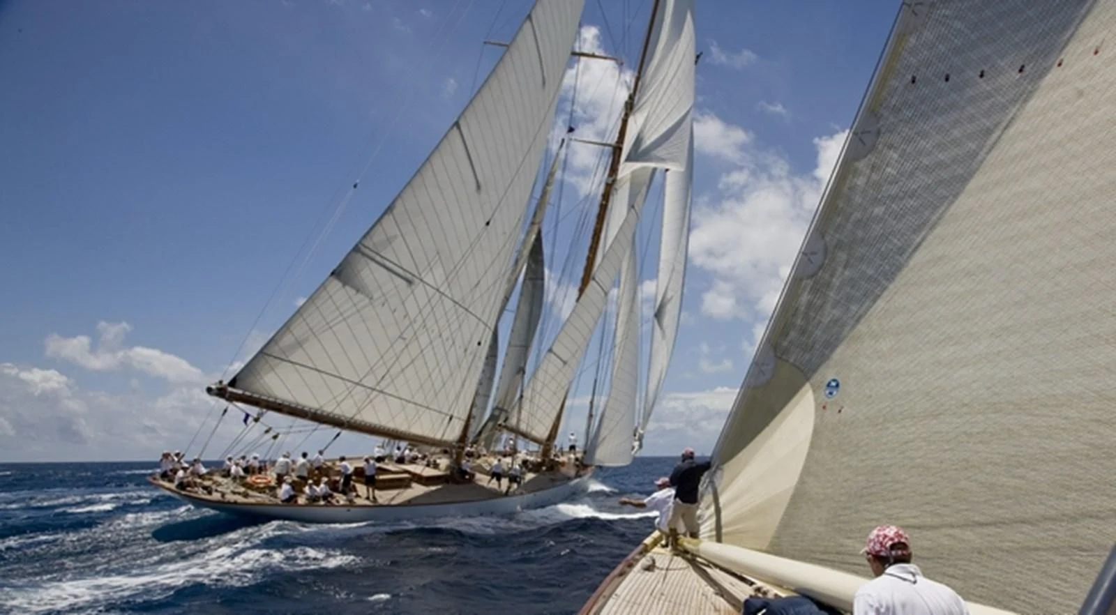 a group of people sailing on a boat aboard ELEONORA E Yacht for Sale