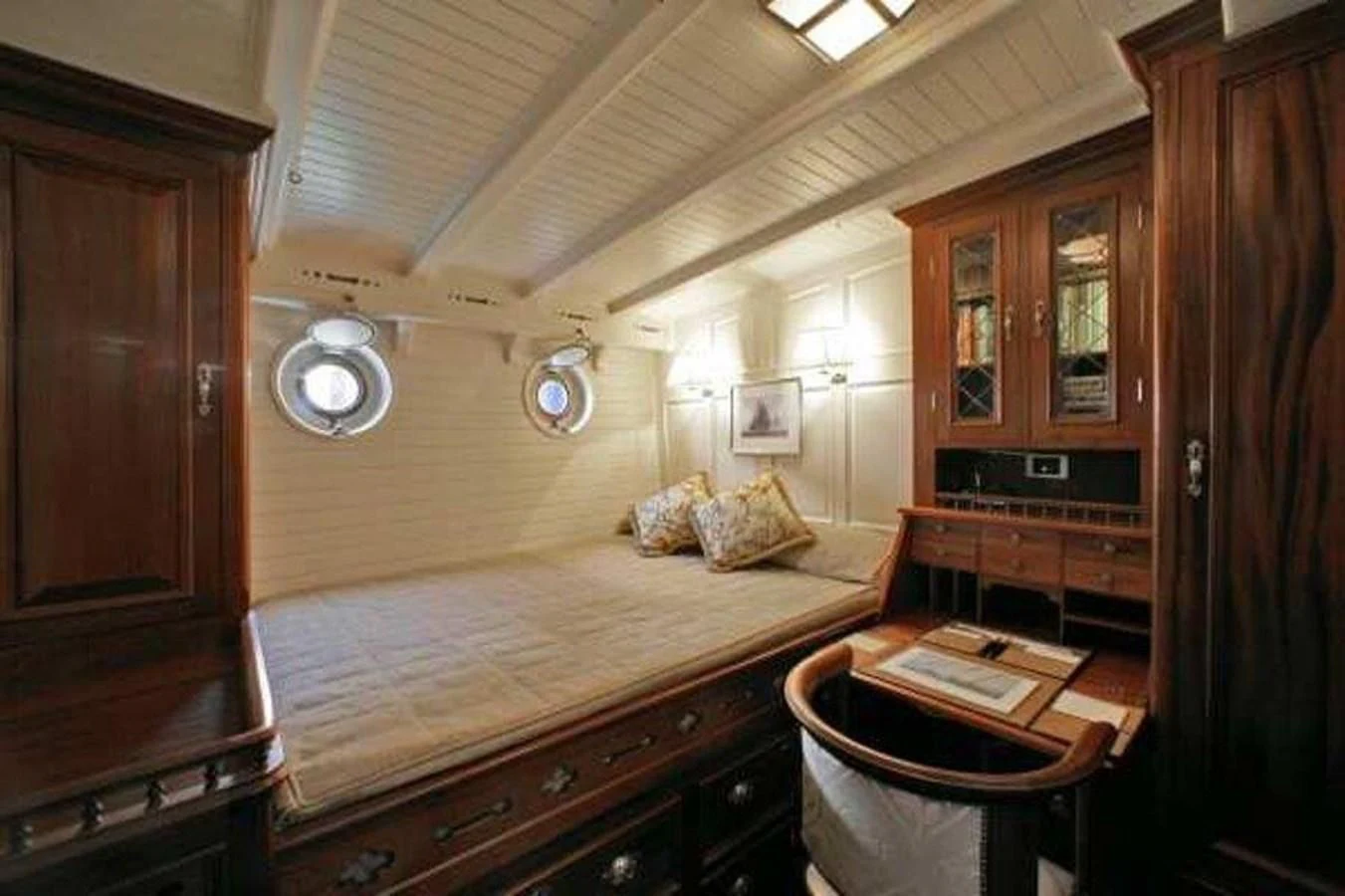 a bed in a room aboard ELEONORA E Yacht for Sale