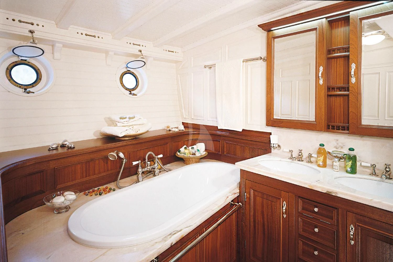 a large bathroom with a large white tub aboard ELEONORA E Yacht for Sale