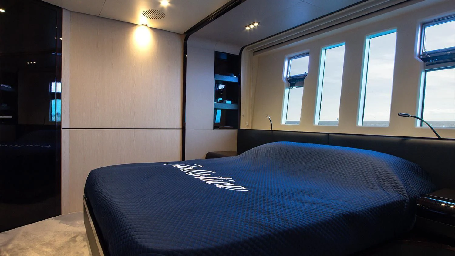 a bed in a room aboard SOLSTICE Yacht for Sale