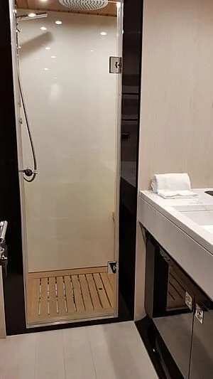 a bathroom with a shower aboard SOLSTICE Yacht for Sale