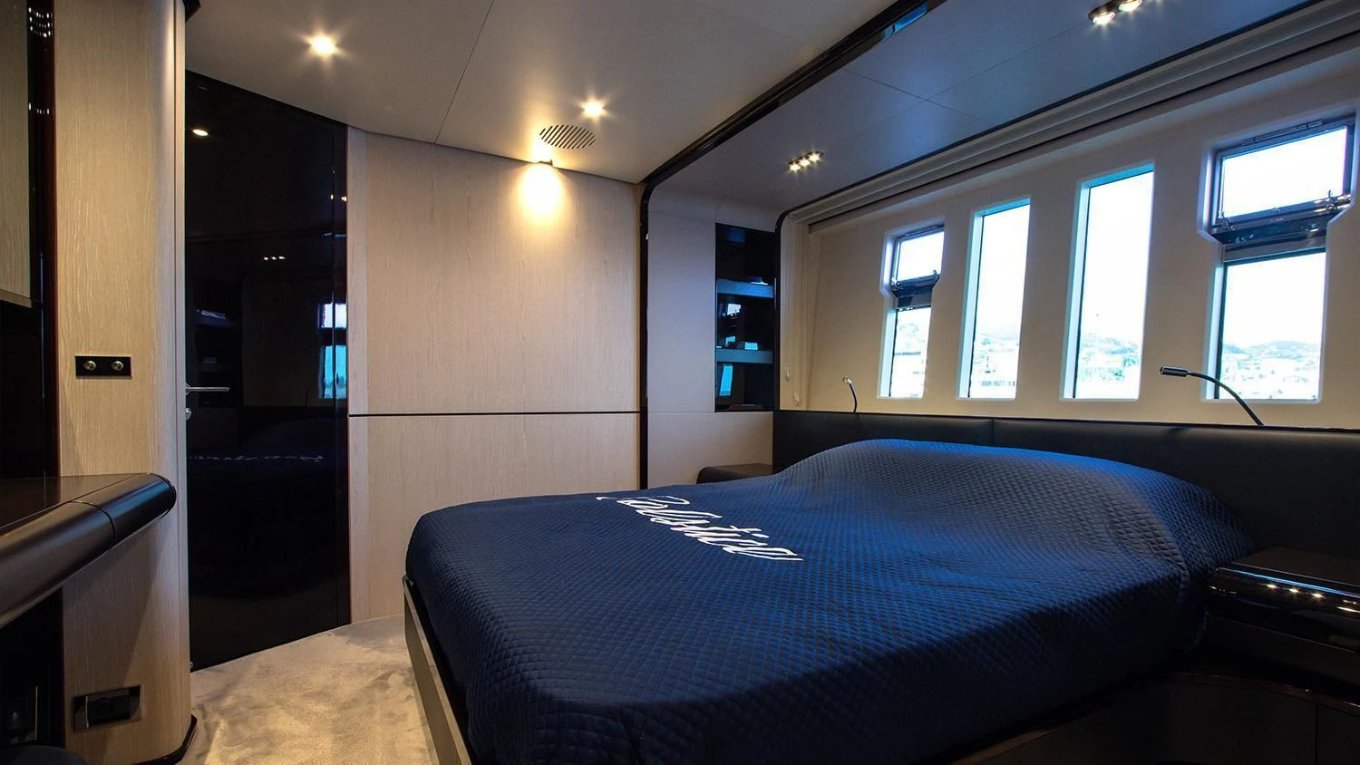 a bedroom with a bed aboard SOLSTICE Yacht for Sale