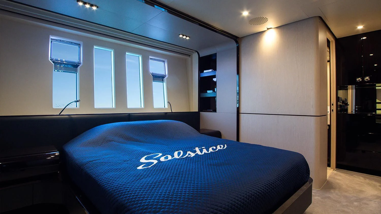 a bed in a room aboard SOLSTICE Yacht for Sale