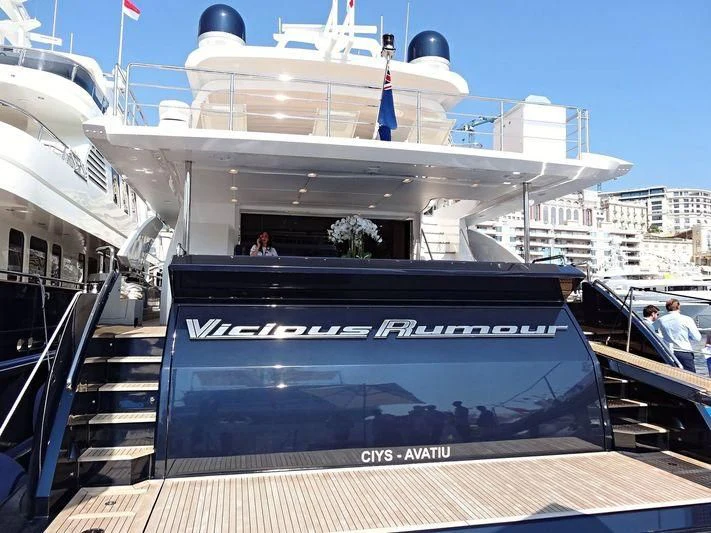 a large white boat with a black screen and a black screen aboard SOLSTICE Yacht for Sale