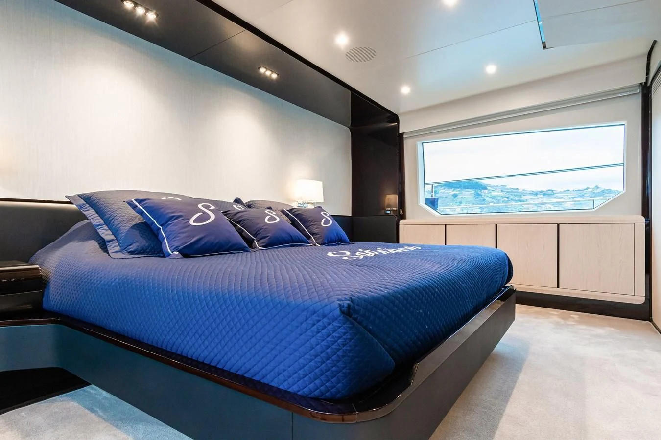 a bed in a room aboard SOLSTICE Yacht for Sale