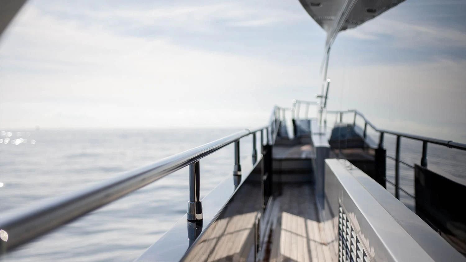 a wooden walkway on a boat aboard SOLSTICE Yacht for Sale