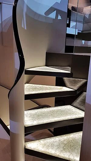 a black and white striped chair aboard SOLSTICE Yacht for Sale