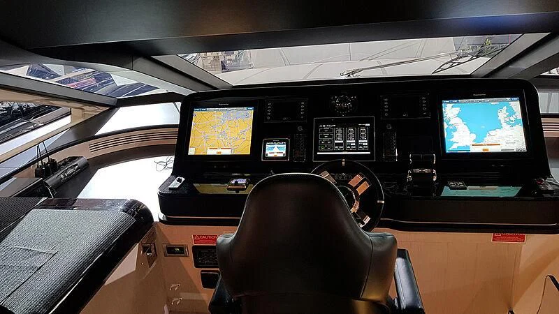 a room with computers and monitors aboard SOLSTICE Yacht for Sale