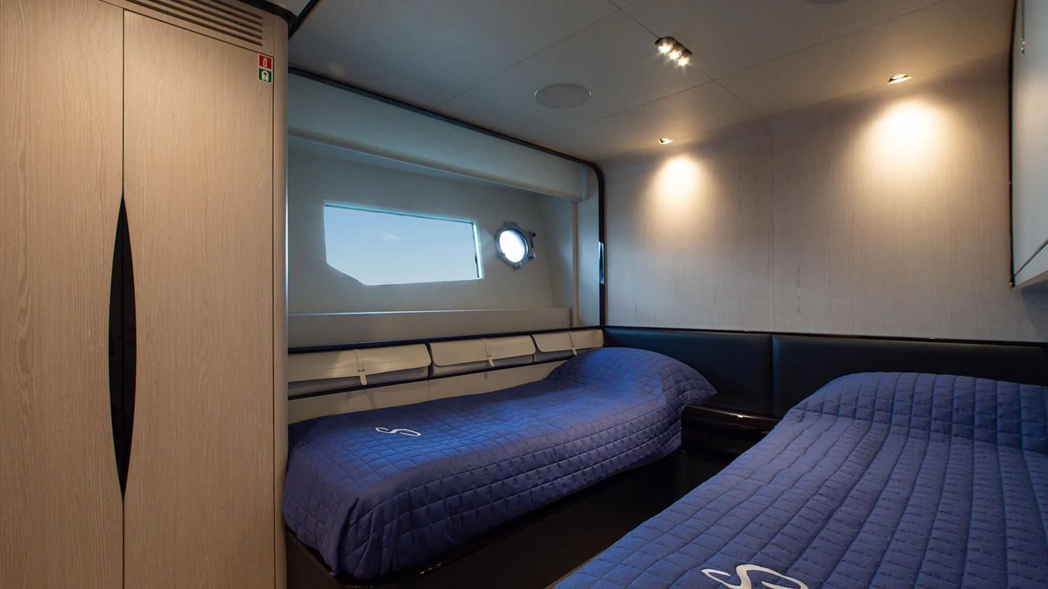 a room with two beds aboard SOLSTICE Yacht for Sale