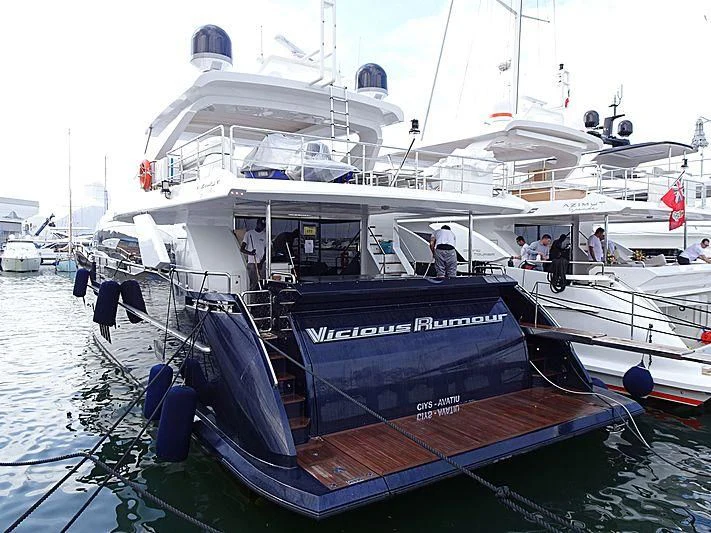 a boat docked at a pier aboard SOLSTICE Yacht for Sale