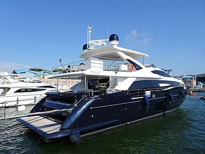 a large boat in the water aboard SOLSTICE Yacht for Sale